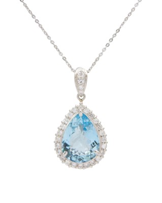 Lot 130 - A platinum pendant, set with a large pear-shaped aquamarine and diamonds.