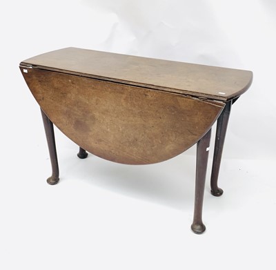 Lot 3020 - An early George III mahogany drop leaf oval...