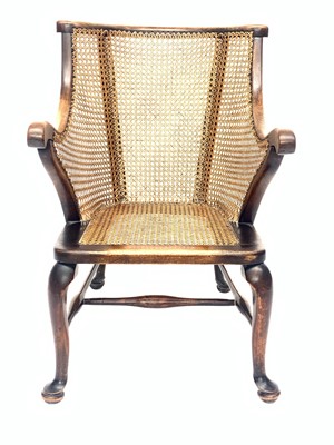 Lot 3019 - A mahogany and beech bergere armchair, 1920s,...