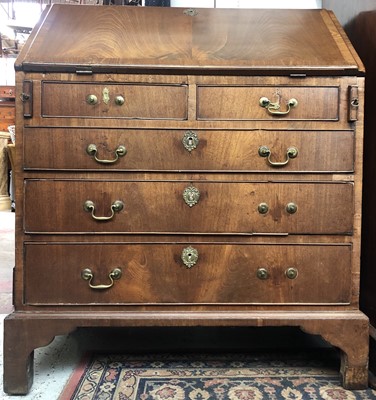 Lot 3191 - A George III mahogany bureau, the fall front...
