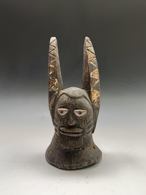 Lot 98 - An African carved headdress, probably Yoruba...