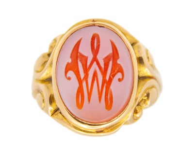 Lot 140 - A Victorian 18k sardonyx monogram intaglio set gentleman's signet ring.
