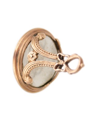 Lot 564 - A 19th century rose gold (tests 14k) watch chain seal fob with quartz intaglio.