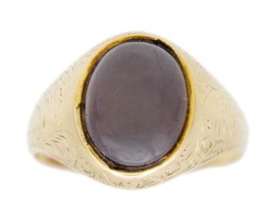 Lot 191 - A 19th-century 14k gold gentleman's signet ring, set with an oval cabochon garnet.