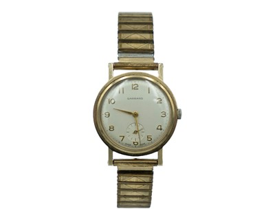 Lot 635 - GARRARD - A 1960'S 9K cased gentleman's manual wind dress watch.