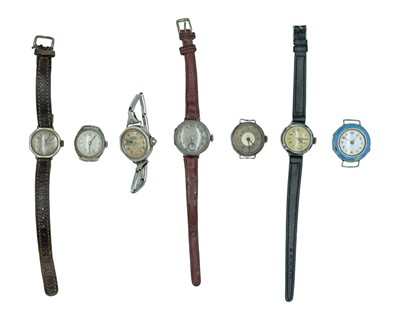 Lot 711 - A collection of seven Swiss early 20th-century silver-cased lady's manual wind wristwatches.