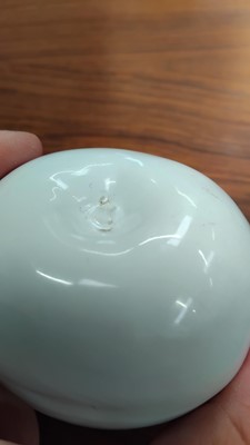 Lot 108 - A Troika white pottery apple.