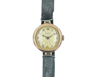Lot 694 - BUREN - A 1920's 9k rose gold lady's manual wind wristwatch.