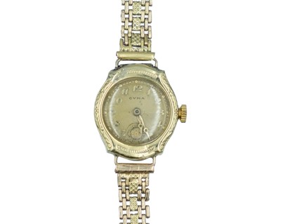 Lot 630 - CYMA - A 14k lady's manual wind bracelet wristwatch.