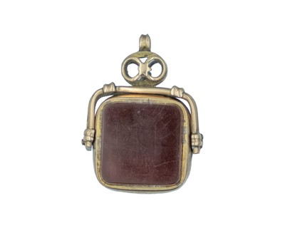 Lot 601 - A 9k rose gold bloodstone and carnelian set swivel watch fob.