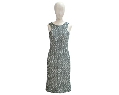 Lot 310 - A Chanel boucle dress.