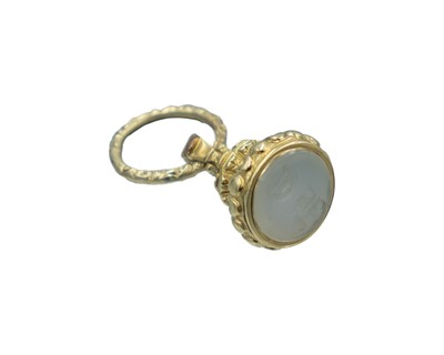 Lot 603 - A 19th-century gold fob seal, attached to a gold foliate cast split ring.