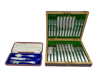 Lot 144 - A silver christening cutlery set.