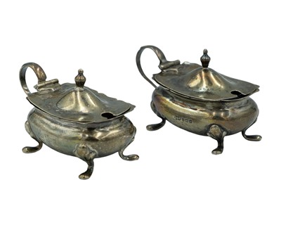 Lot 133 - Two Edward VII silver mustard pots.
