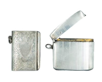 Lot 585 - An Edwardian silver engine turned fob vesta case, and a sterling silver fob pocket lighter.
