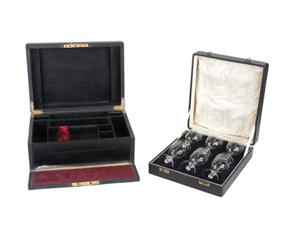 Lot 129 - A late 19th century black leather jewellery box, with brass recessed handle.