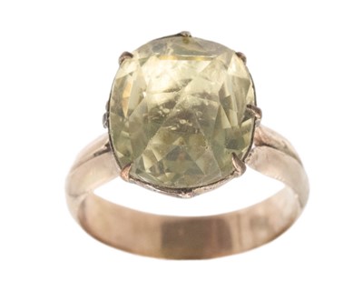 Lot 199 - A Georgian oval rose-cut yellow paste set gold ring.