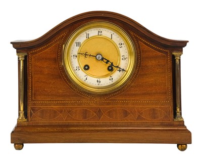 Lot 743 - An Edwardian mahogany mantel clock.