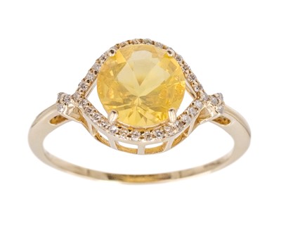Lot 212 - A 14k yellow gold and natural fire opal and diamond ring.