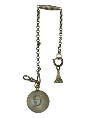 Lot 584 - A Victorian 9k (tested) lady's Albertina watch chain, applied with a seal fob and a pendant locket.