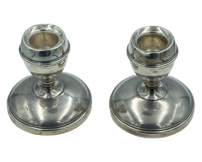 Lot 107 - A pair of silver squat candlesticks by J. B. Chatterley & Sons Ltd.