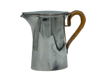 Lot 60 - An Arts and Crafts silver-plated milk jug.