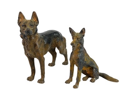 Lot 134 - Two Austrian cold painted bronze figures of German Shepherds.