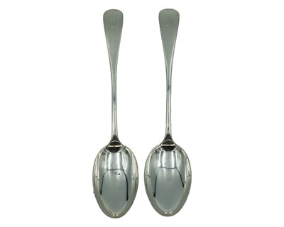 Lot 128 - A pair of silver Old-English pattern tablespoons by John Round & Son Ltd.