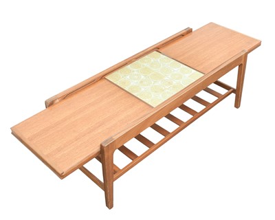 Lot 31 - A Remploy teak extending tiled top coffee table