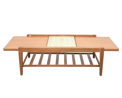 Lot 31 - A Remploy teak extending tiled top coffee table