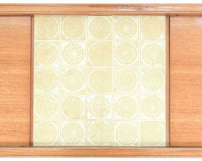 Lot 31 - A Remploy teak extending tiled top coffee table