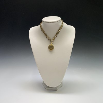 Lot 2524 - A gold locket in Victorian style with a chain...