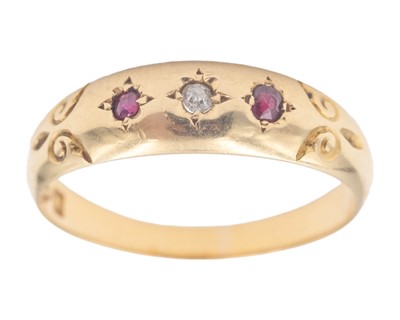 Lot 258 - A Victorian 18k hallmarked gold diamond and ruby three stone set gypsy ring.
