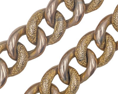 Lot 255 - A 9k hollow curb link bracelet, with textured finish.