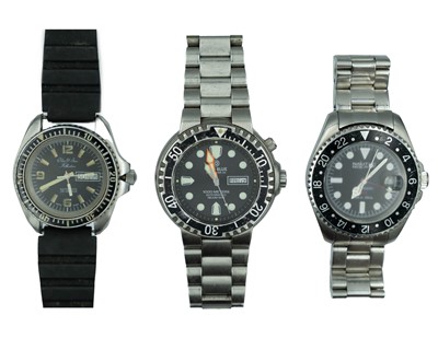 Lot 715 - Three diver's stainless steel automatic gentleman's wristwatches.