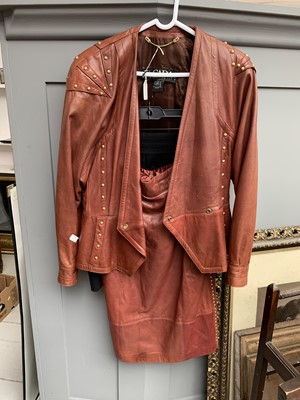 Lot 2813 - A butter soft, 2-piece chesnut leather skirt...