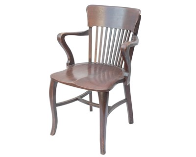 Lot 862 - A mahogany slat back office elbow chair.