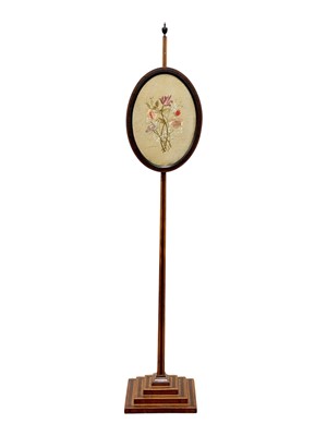 Lot 926 - A 19th century mahogany and satinwood pole screen.