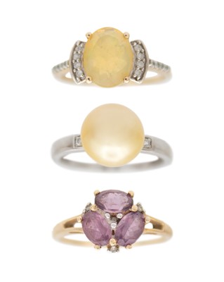 Lot 273 - Three 9k gem set dress rings by Gemporia.