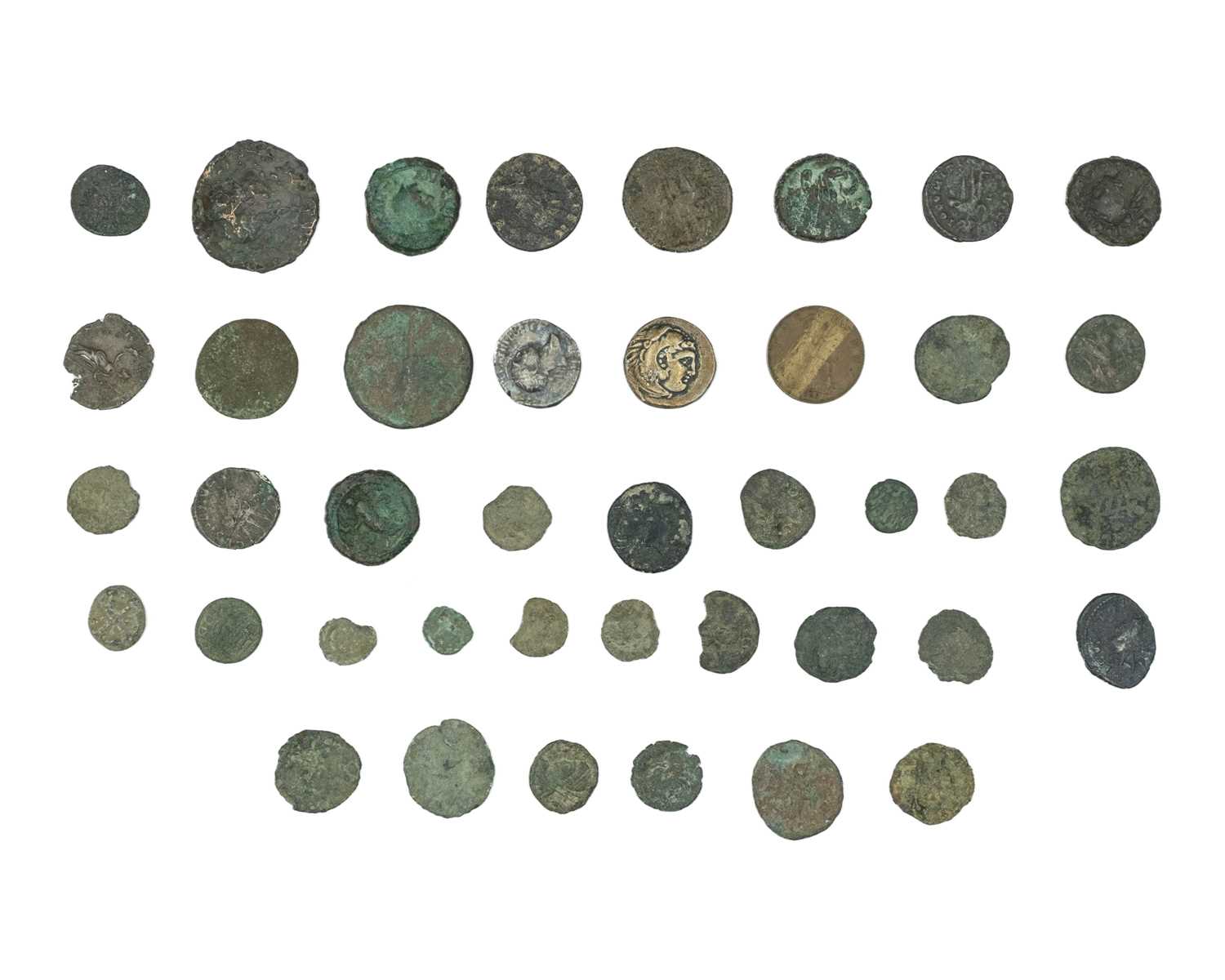 Lot 11 - CLASSICAL ANCIENT WORLD - A collection of debased bronze coinage, incuding a Roman Denarius.