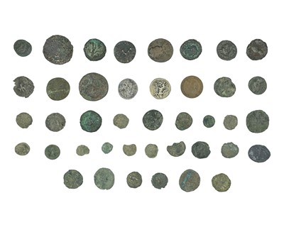 Lot 11 - CLASSICAL ANCIENT WORLD - A collection of debased bronze coinage, incuding a Roman Denarius.