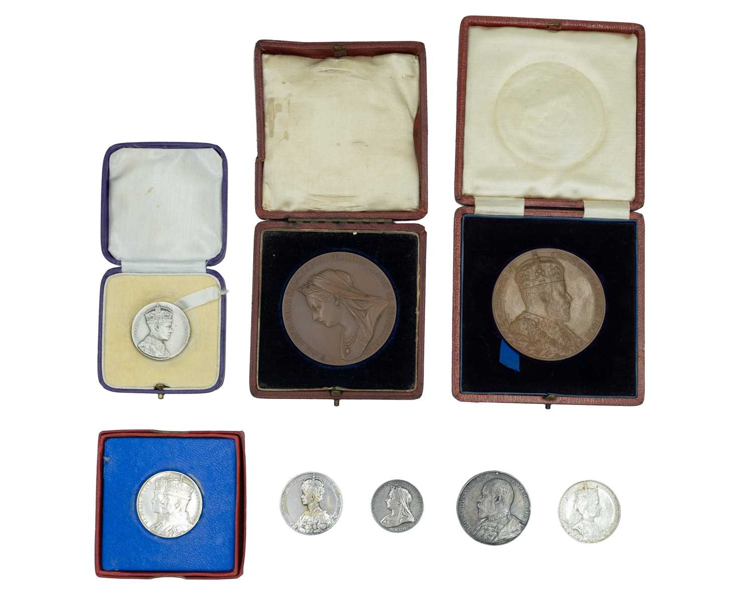 Lot 34 - ROYAL COMMEMORATIVE MEDALS - four silver Coronation medals,and two bronze medals.