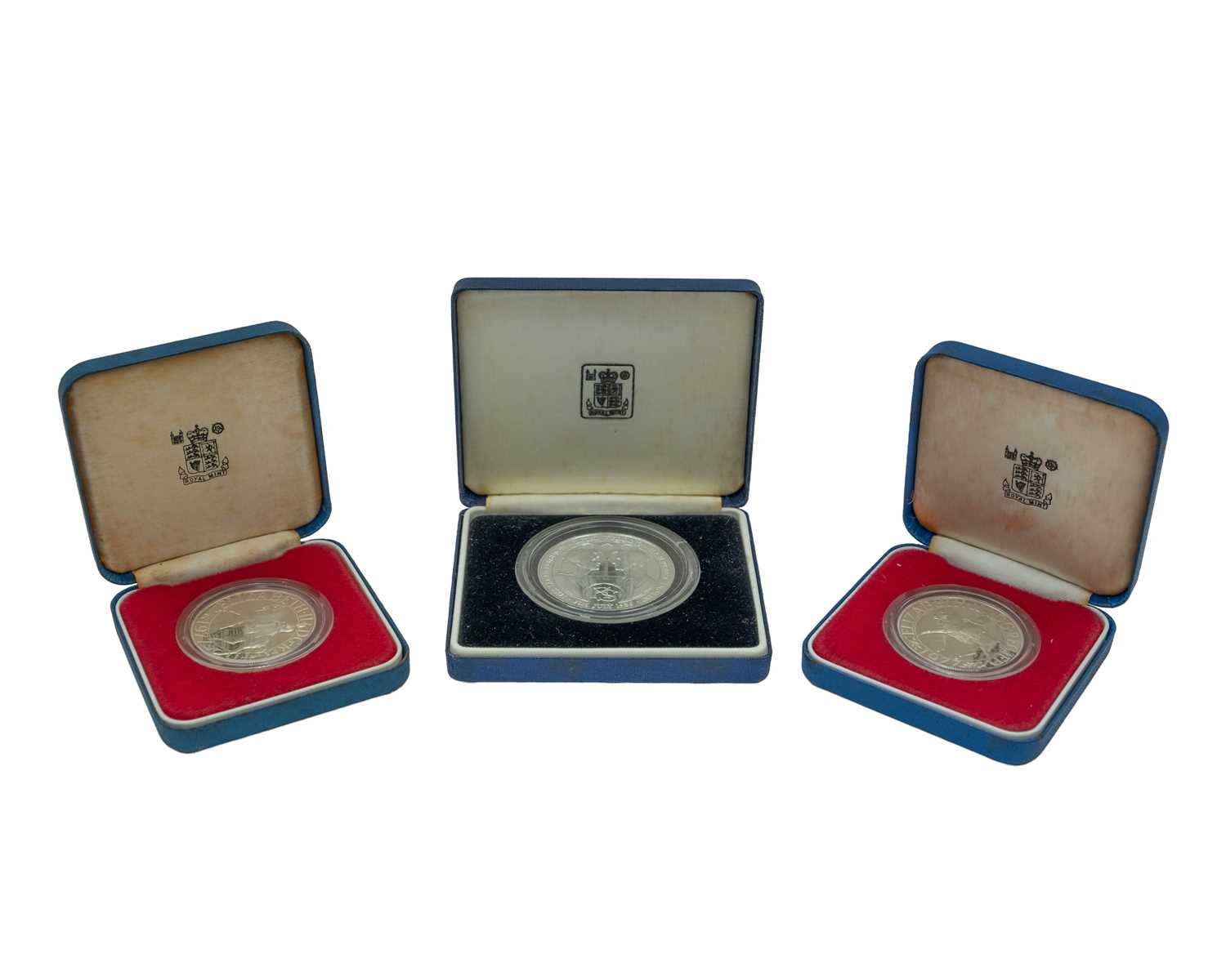 Lot 17 - Three QEII Royal Commemorative .925 silver proof crown coins, cased with certificates.