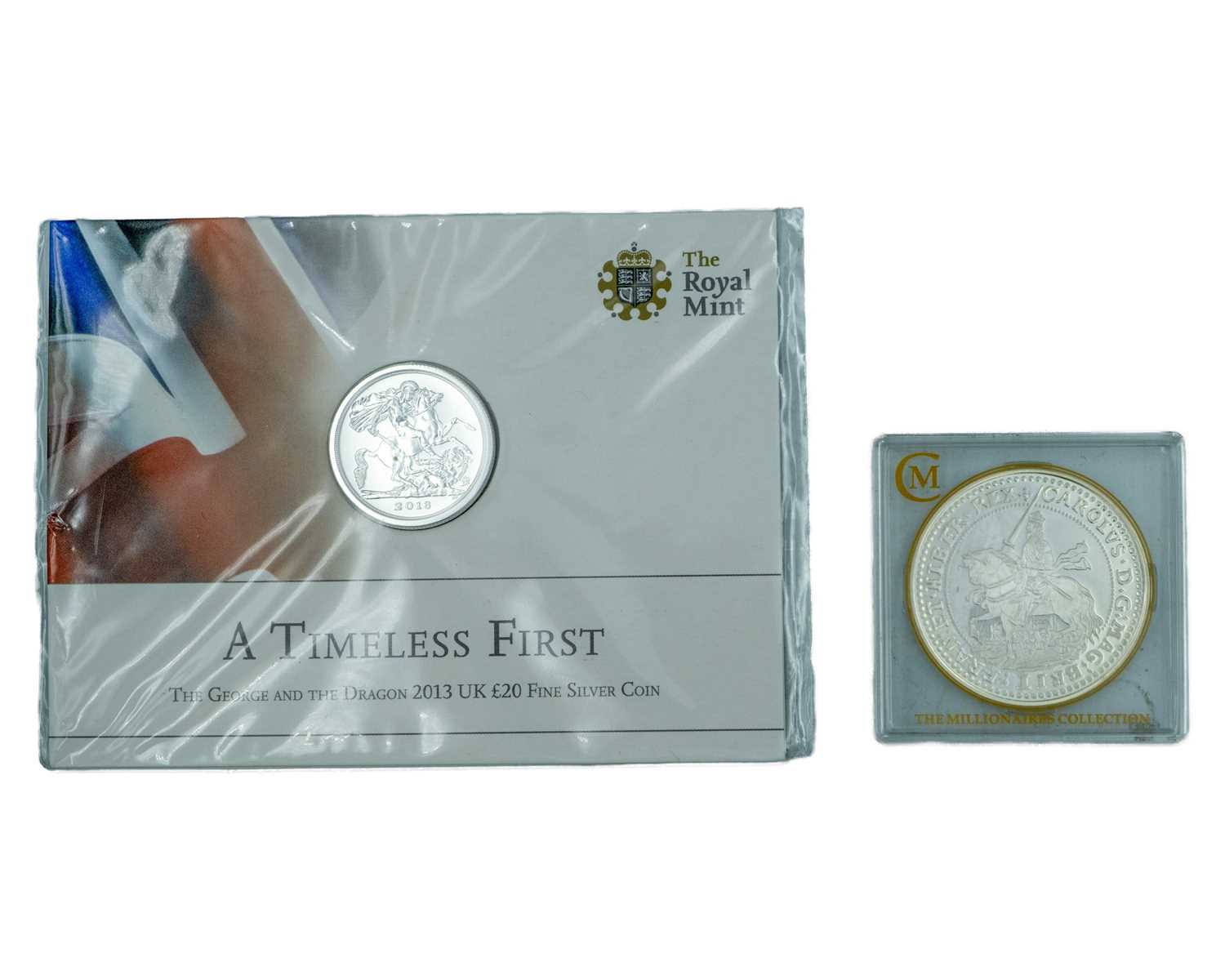 Lot 27 - GB - Two silver proof coins, one a £20 .999 fine silver, the other a Charles I Millionaires Collection crown.
