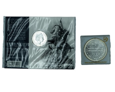 Lot 27 - GB - Two silver proof coins, one a £20 .999 fine silver, the other a Charles I Millionaires Collection crown.