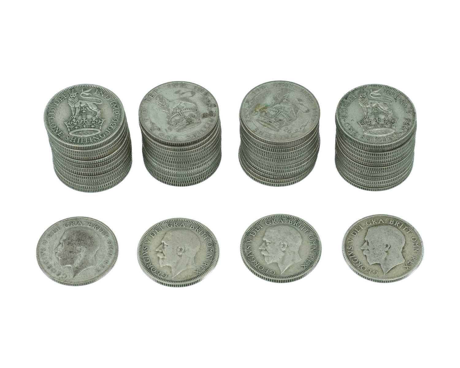 Lot 19 - GB - A collection of George V, pre-1947, .500 silver, one shilling coins.
