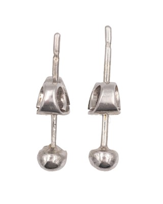 Lot 7 - An early 20th-century pair of platinum and diamond set knife-edge bar pendant earrings.