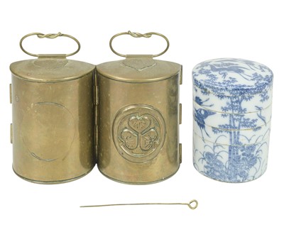 Lot 518 - A Japanese blue and white porcelain tiffin or cosmetic container.