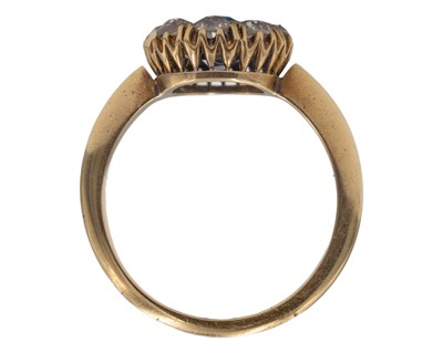 Lot An attractive Victorian 18k diamond and cushion-cut blue sapphire set cluster ring.