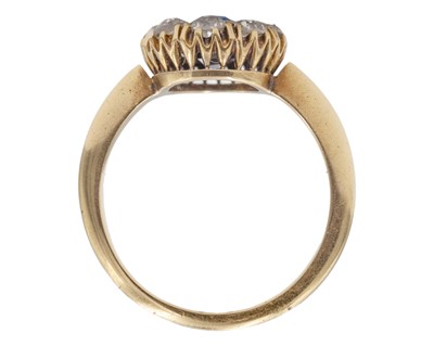 Lot An attractive Victorian 18k diamond and cushion-cut blue sapphire set cluster ring.